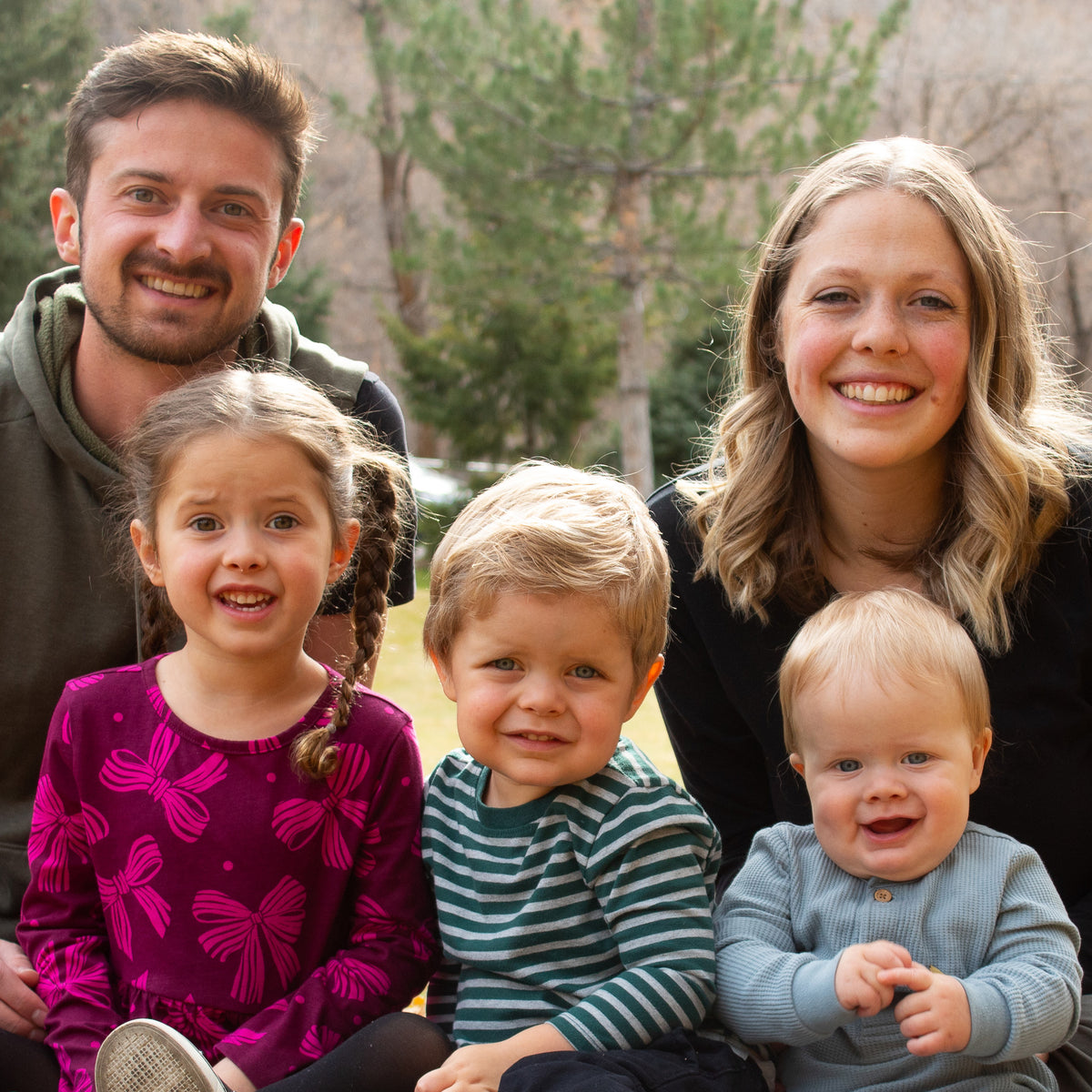Morgan and Garret Griffin outdoors with their three children